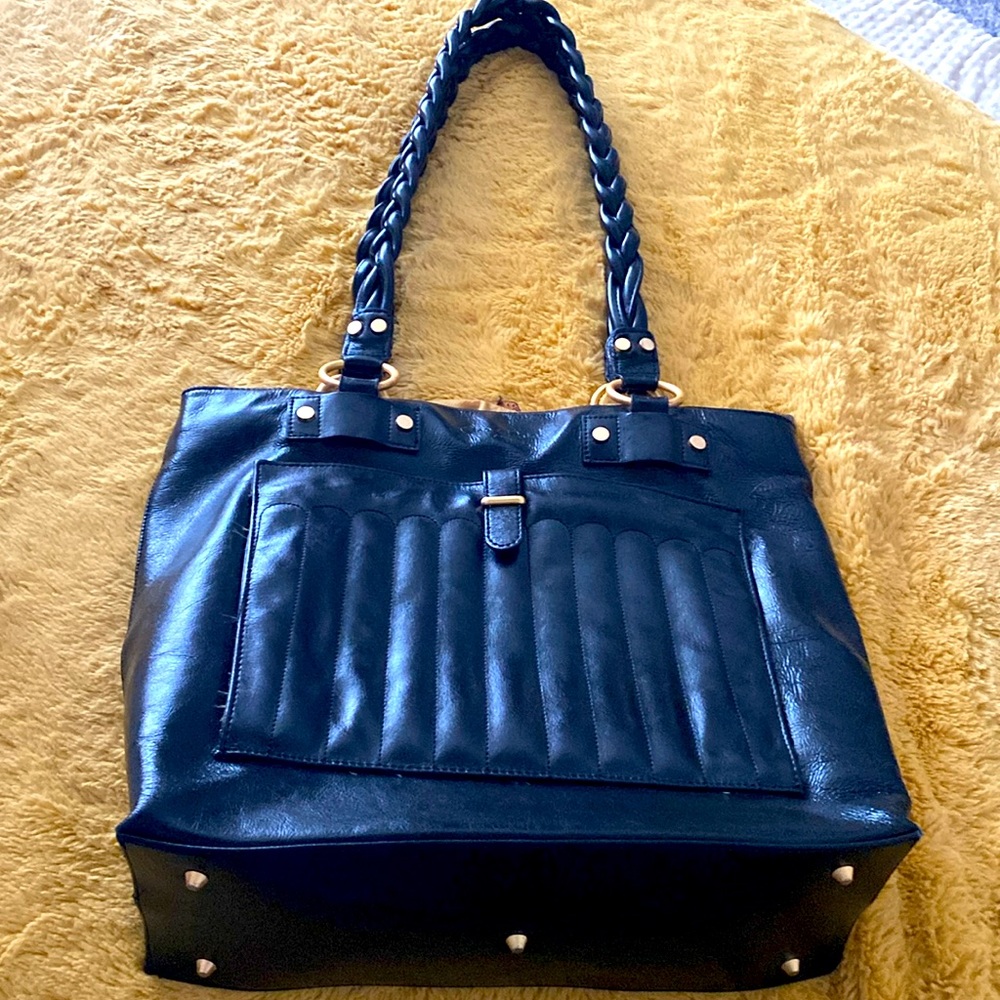 Cleo and Patek genuine leather shoulder bag.